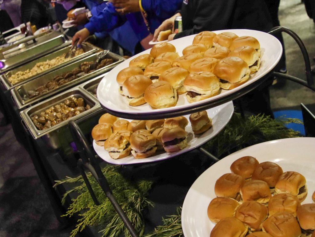 A long line at the slider station, where NYSUT educators could choose between bacon cheeseburgers, chicken sliders or roasted vegetable sliders with hummus.